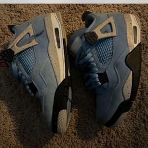 university blue jordan 4